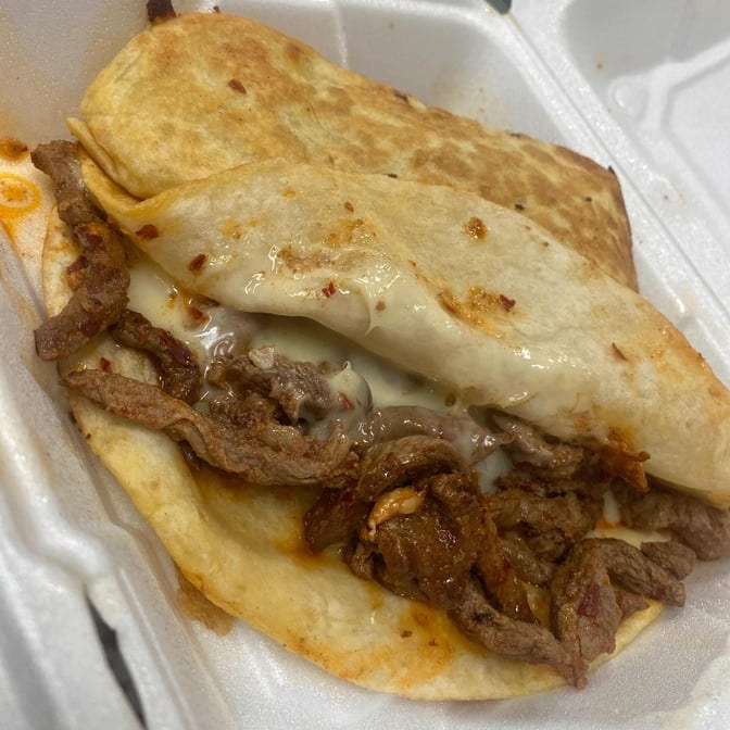 (2) Grilled Steak Quesadillas.